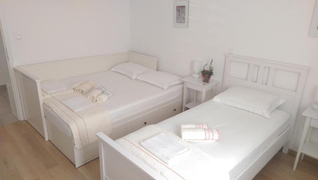 Postel nebo postele na pokoji v ubytování Holiday home Olive