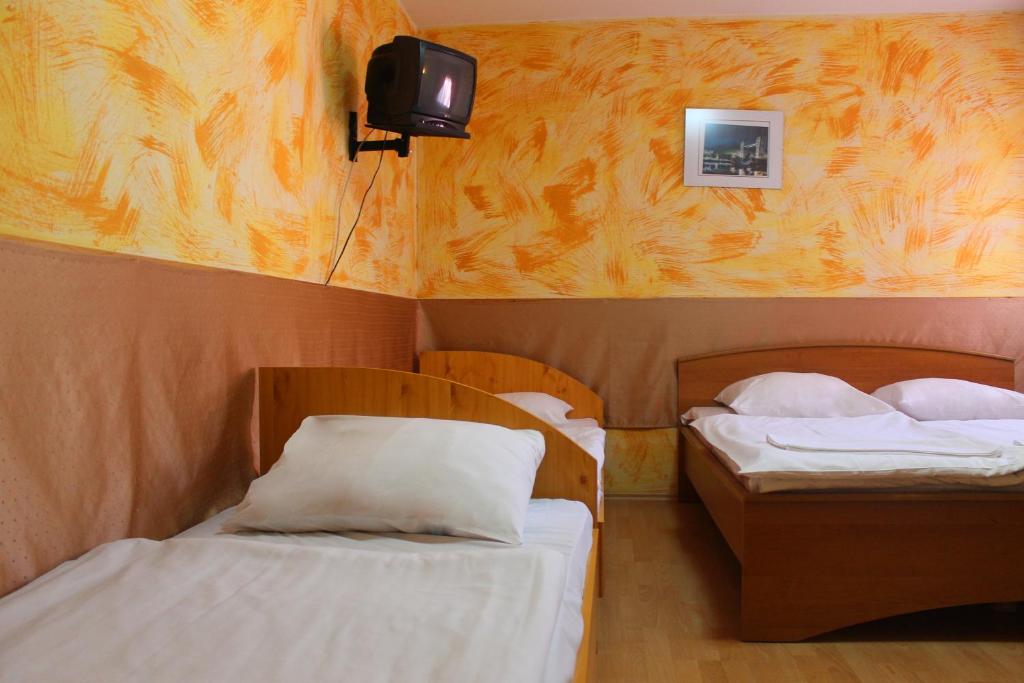 Postel nebo postele na pokoji v ubytování Motelnet.T