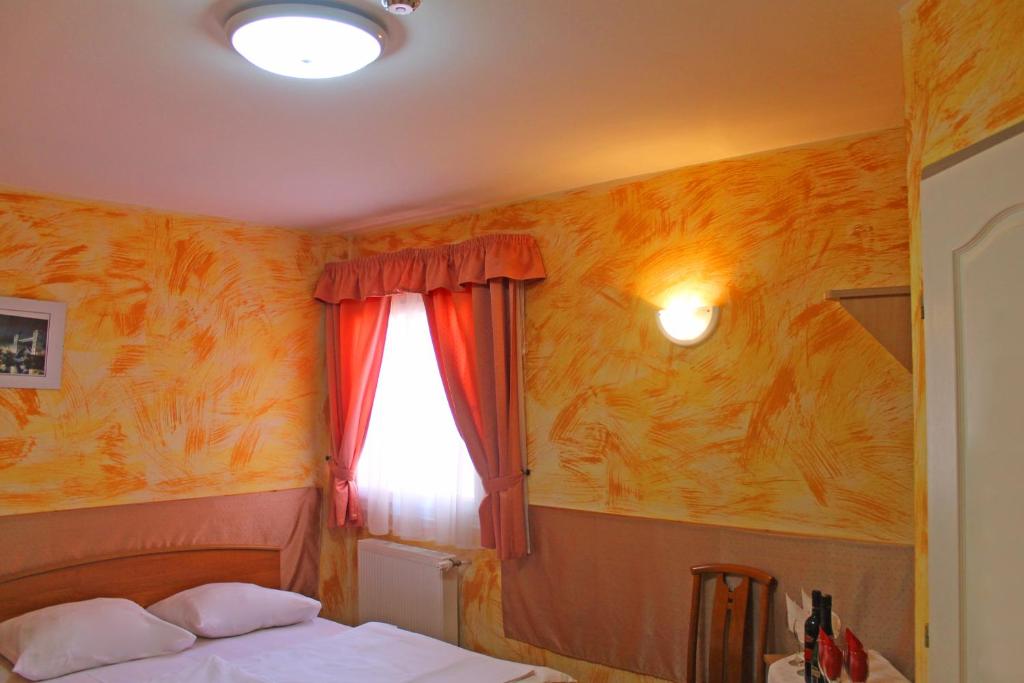 Postel nebo postele na pokoji v ubytování Motelnet.T