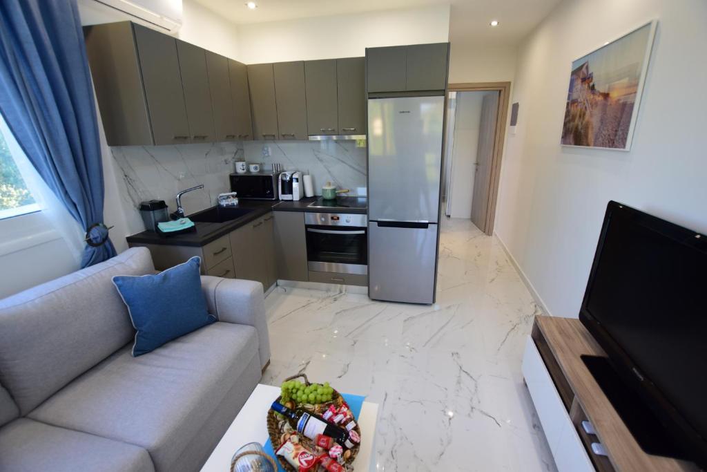 Kuchyň nebo kuchyňský kout v ubytování V Luxury Suites Toroni 1