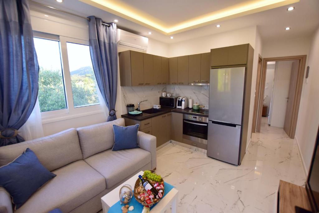 Kuchyň nebo kuchyňský kout v ubytování V Luxury Suites Toroni 1