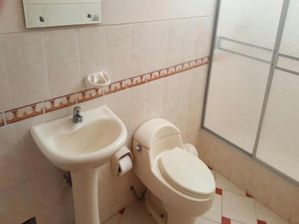 Koupelna v ubytování Hotel Arunta