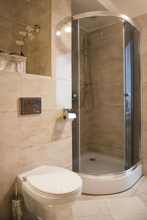 Kúpeľňa v ubytovaní Olla apartmány