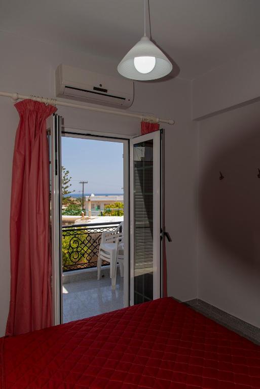 Postel nebo postele na pokoji v ubytování Lazaros Home 1