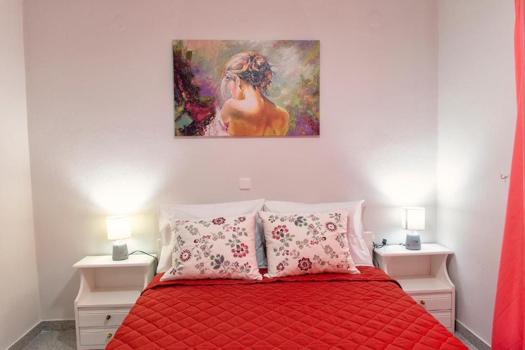 Postel nebo postele na pokoji v ubytování Lazaros Home 1