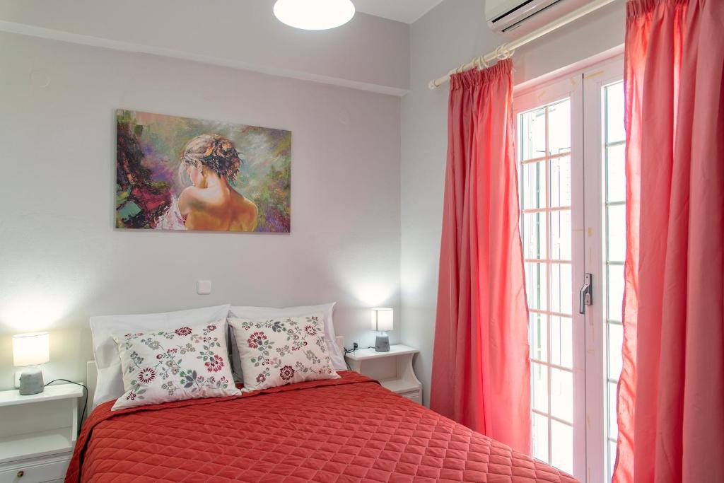 Postel nebo postele na pokoji v ubytování Lazaros Home 1
