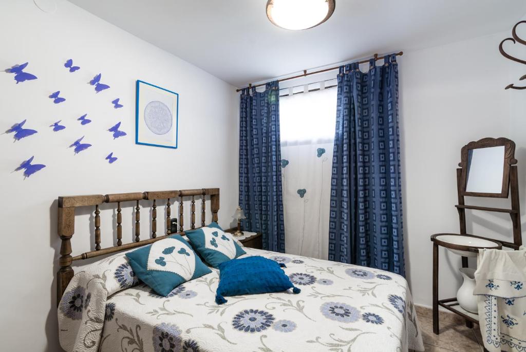 Postel nebo postele na pokoji v ubytování Casa Josefina