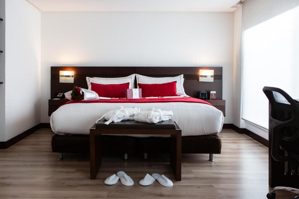 Postel nebo postele na pokoji v ubytování Best Western Plus 93 Park Hotel