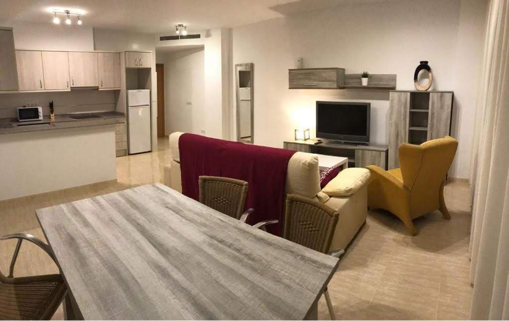 A kitchen or kitchenette at Apartamentos Prado