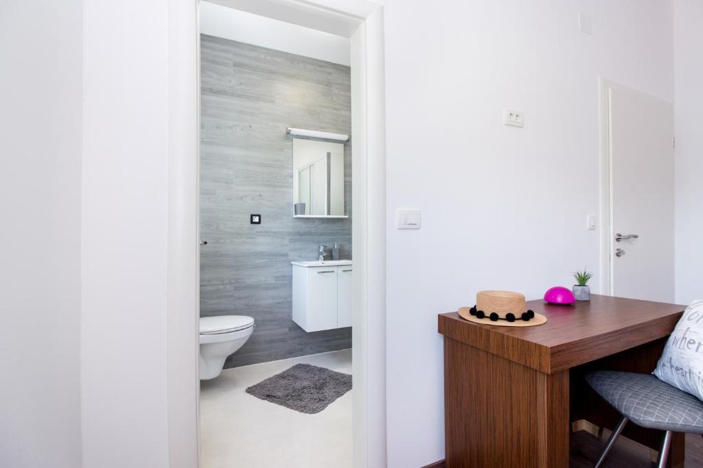 Kúpeľňa v ubytovaní Apartment Villa Rina- Heated salt water Pool