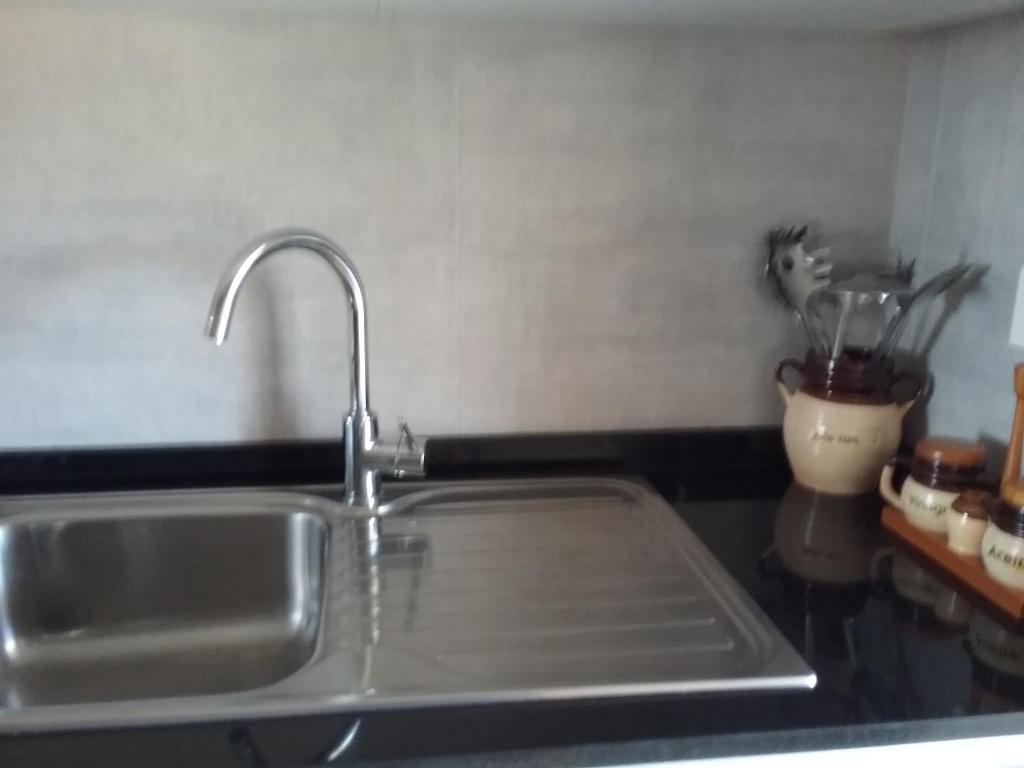 Kuchyň nebo kuchyňský kout v ubytování Apartamento Teatinos Málaga
