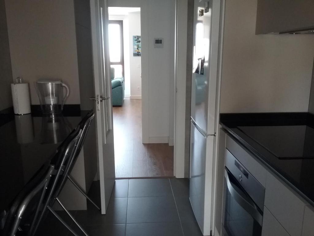 Kuchyň nebo kuchyňský kout v ubytování Apartamento Teatinos Málaga