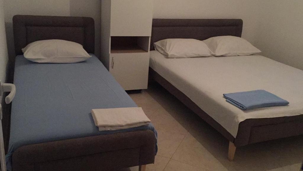 Postel nebo postele na pokoji v ubytování Apartments Beho