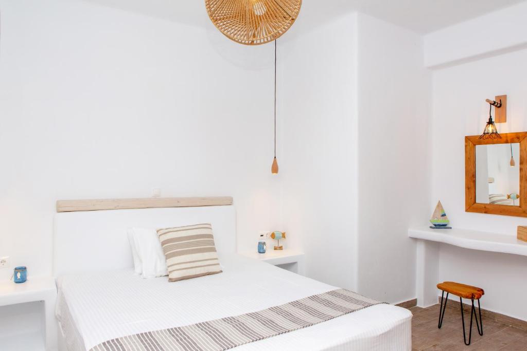 Postel nebo postele na pokoji v ubytování Salinus Beachfront Private Pool Villas