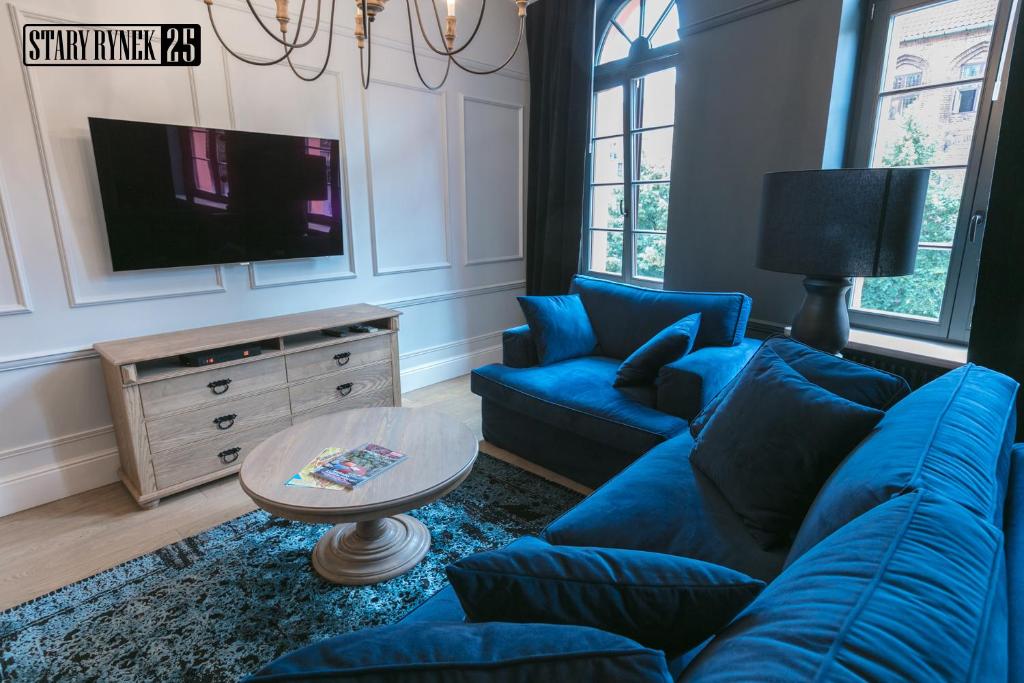Telewizja i/lub zestaw kina domowego w obiekcie Apartamenty Stary Rynek 25 Toruń