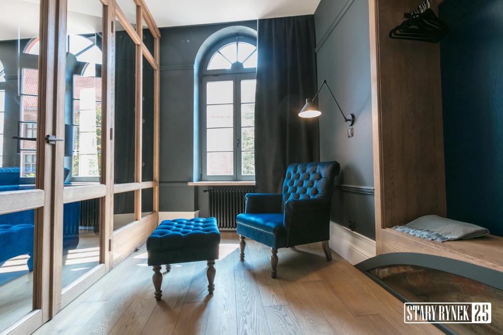 Łóżko lub łóżka w pokoju w obiekcie Apartamenty Stary Rynek 25 Toruń