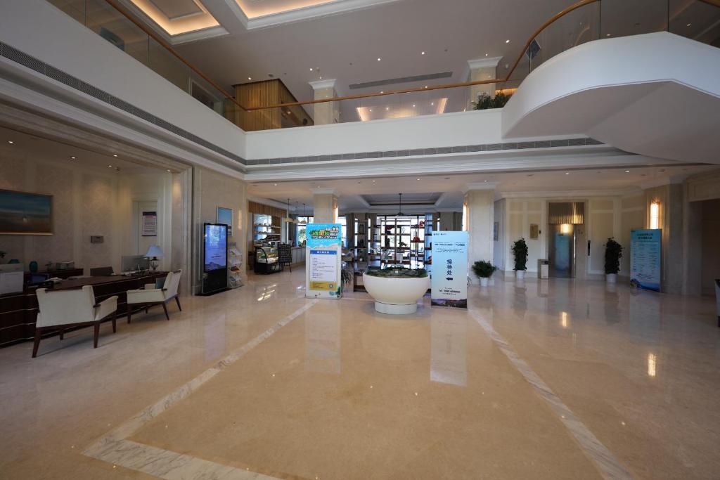 Lobby&#47;Rezeption in der Unterkunft Pinxiayuan Apartment in Lvcheng Resort