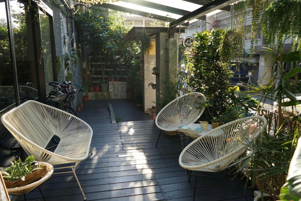 Zahrada ubytování NiHao Café Hotel