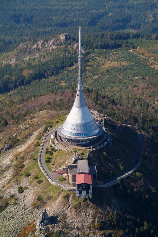 an aerial view of a building with a white roof at Hotel Ještěd in Liberec