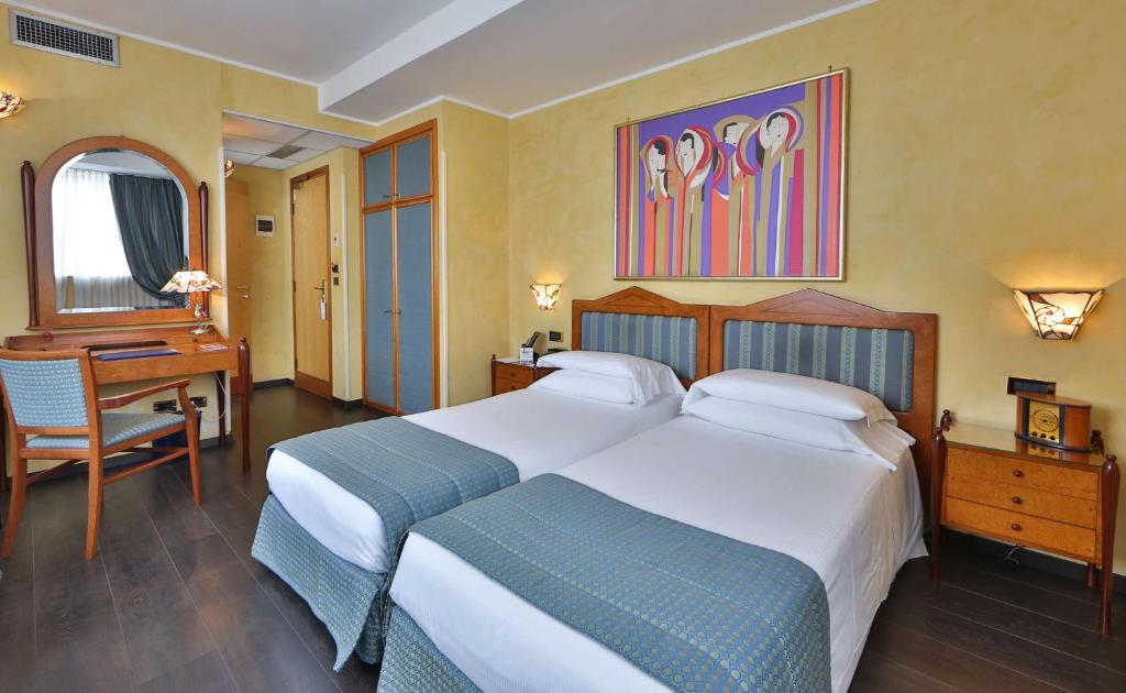 Postel nebo postele na pokoji v ubytování Best Western Hotel Artdeco