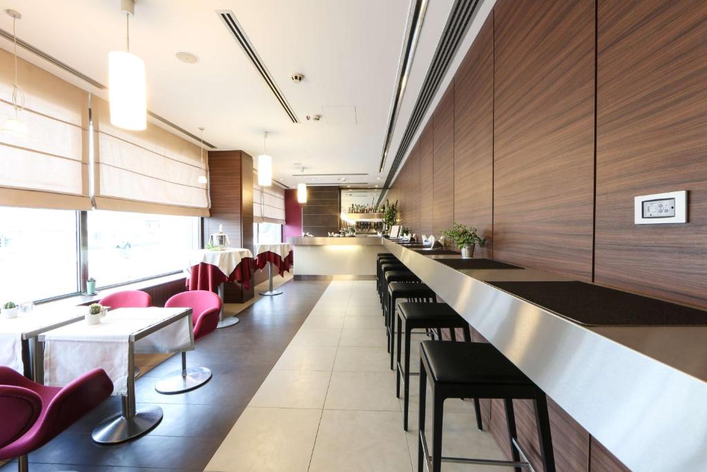 Posezení v ubytování Best Western Plus Hotel Monza e Brianza Palace