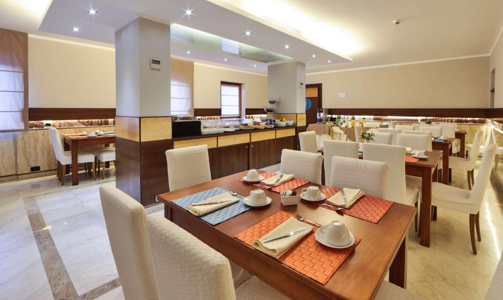 Restaurace v ubytování Suites & Residence Hotel