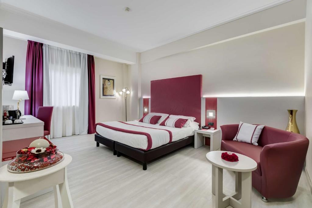 Postel nebo postele na pokoji v ubytování Best Western Hotel Rocca