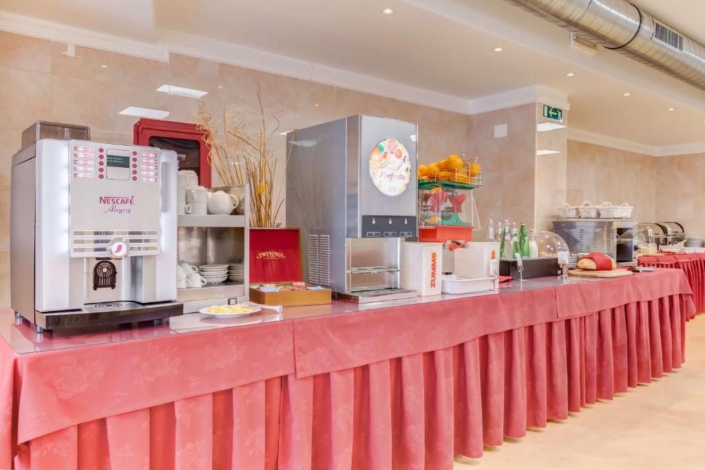 Kuchyň nebo kuchyňský kout v ubytování Best Western Hotel Rocca