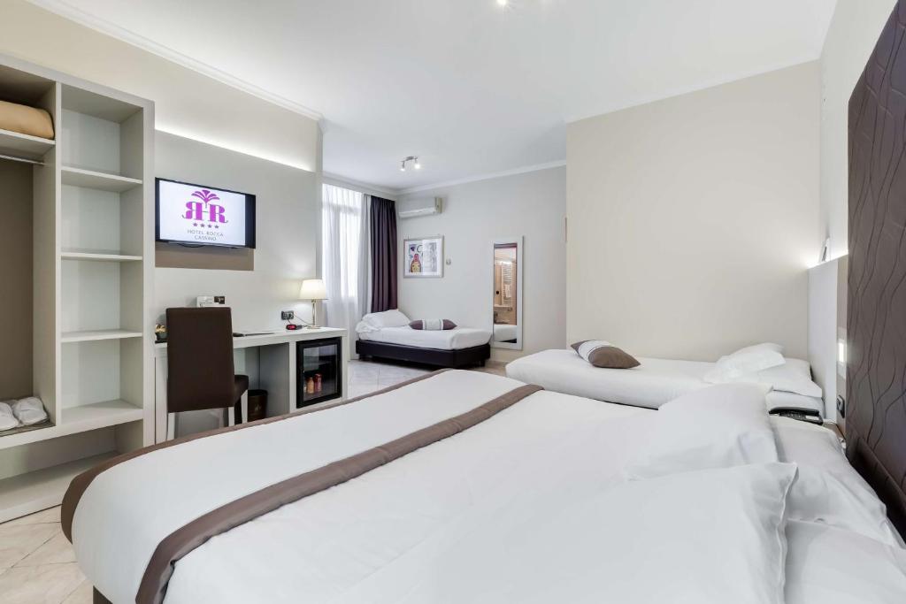 Postel nebo postele na pokoji v ubytování Best Western Hotel Rocca