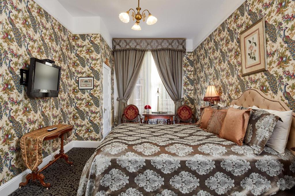 Postel nebo postele na pokoji v ubytování Queen Anne
