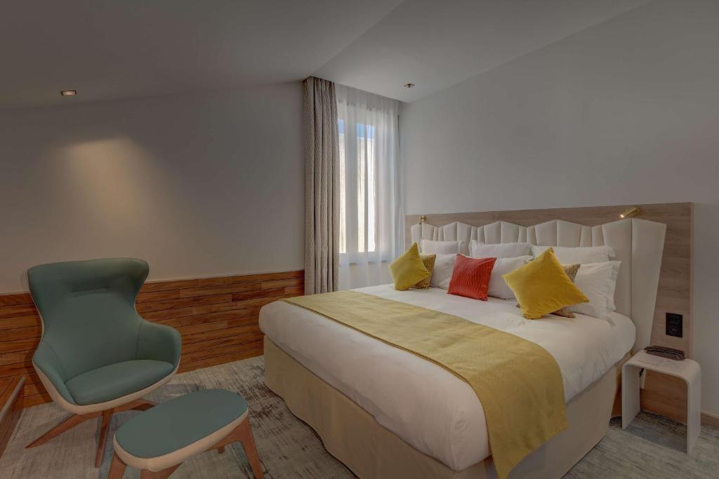 Postel nebo postele na pokoji v ubytování Best Western Plus Comedie Saint Roch