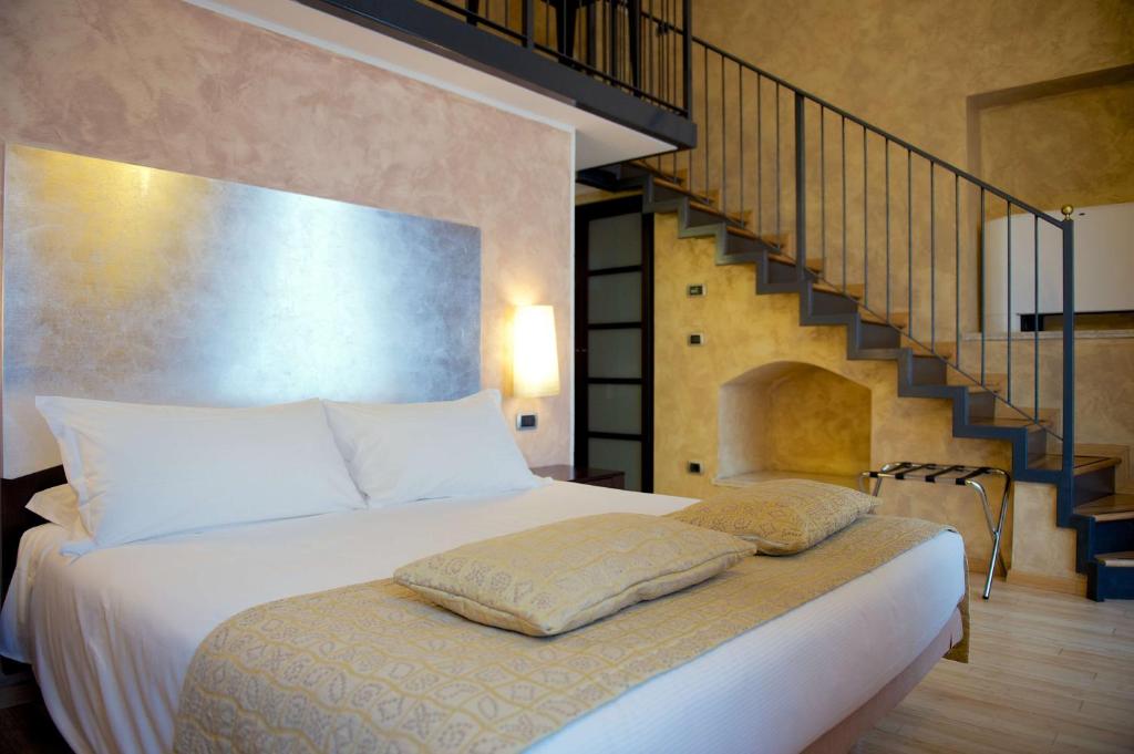 Postel nebo postele na pokoji v ubytování Best Western Crystal Palace Hotel