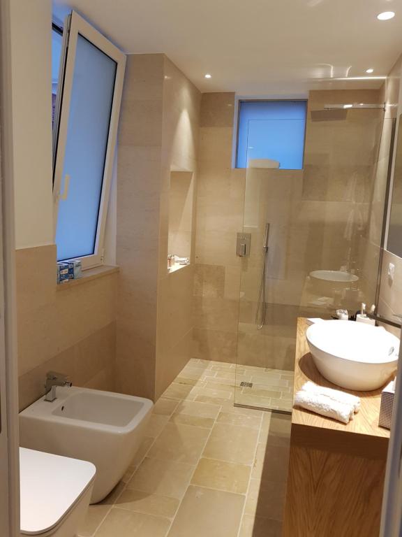 Ванная комната в Iancu Charme Apartments