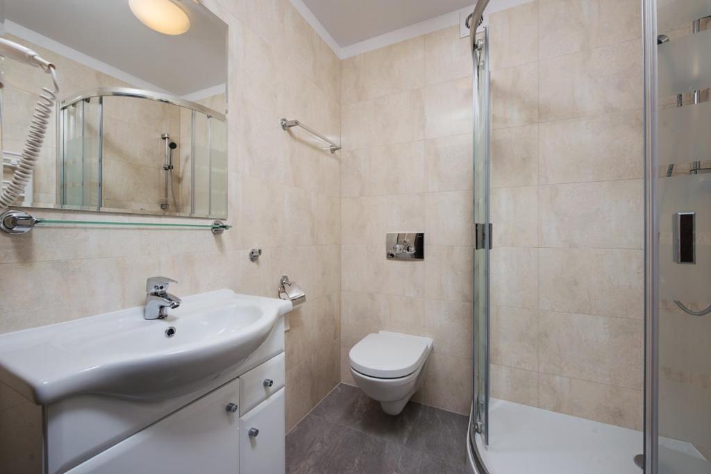 Koupelna v ubytování Hotel Szafir