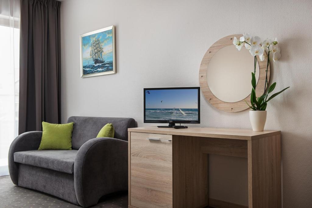 TV a/nebo společenská místnost v ubytování Hotel Szafir