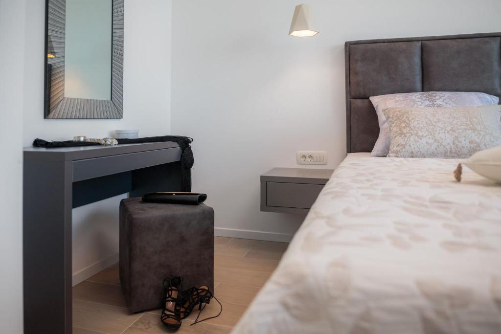 Posteľ alebo postele v izbe v ubytovaní Luxury Villa White Pearl with Pool