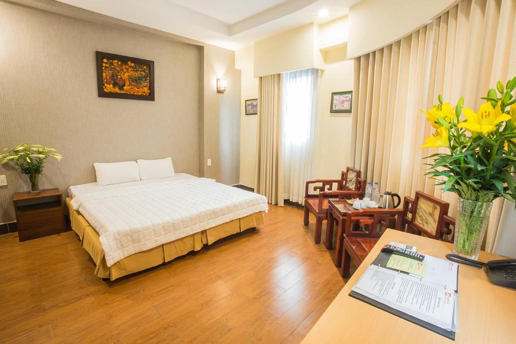 Postel nebo postele na pokoji v ubytování My Lan Hanoi Hotel