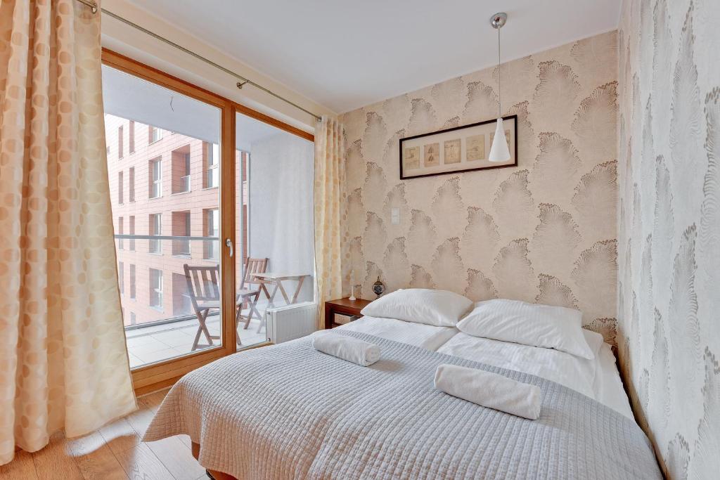 Posteľ alebo postele v izbe v ubytovaní Aura Apartments Old Town
