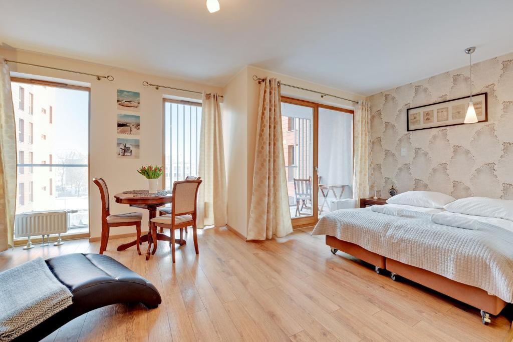 Posteľ alebo postele v izbe v ubytovaní Aura Apartments Old Town