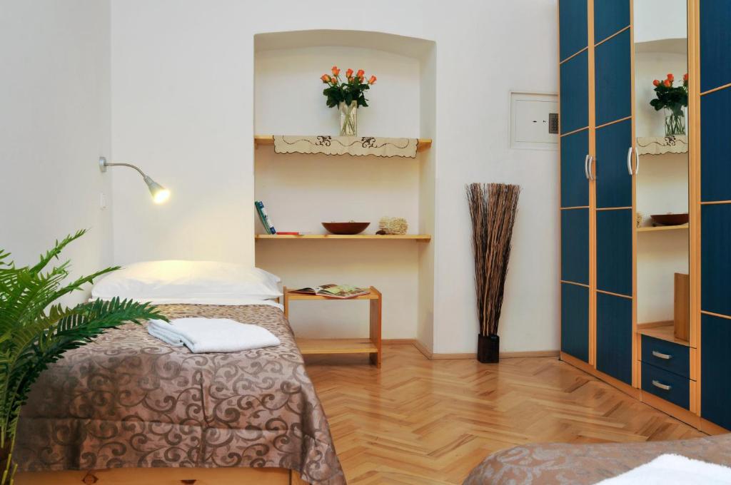Postel nebo postele na pokoji v ubytování Pension Prague City