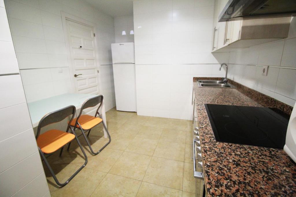 Kuchnia lub aneks kuchenny w obiekcie Expoholidays - Apartamentos en primera linea
