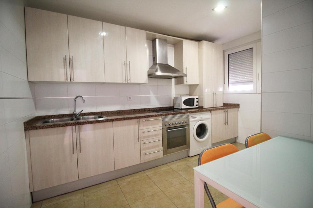 Kuchnia lub aneks kuchenny w obiekcie Expoholidays - Apartamentos en primera linea