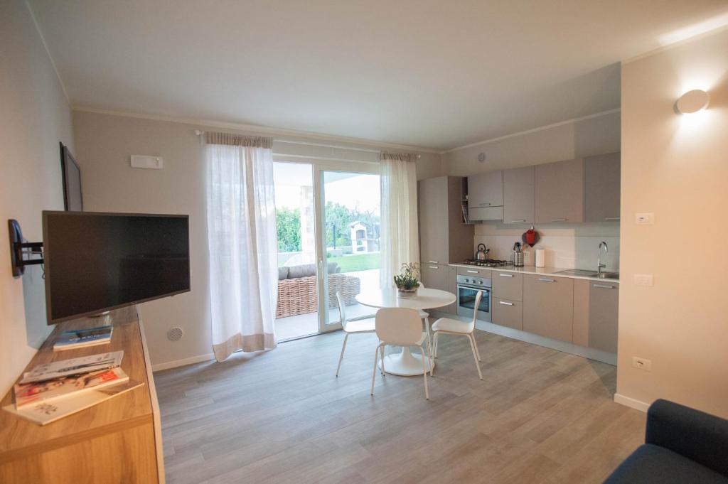 Kuchyňa alebo kuchynka v ubytovaní Italianflat - Maison du Lac