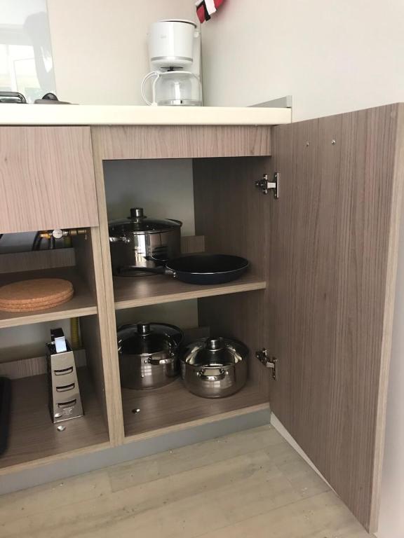 Kuchyň nebo kuchyňský kout v ubytování SunVillage Camp- Mobilházak Alsóörsön