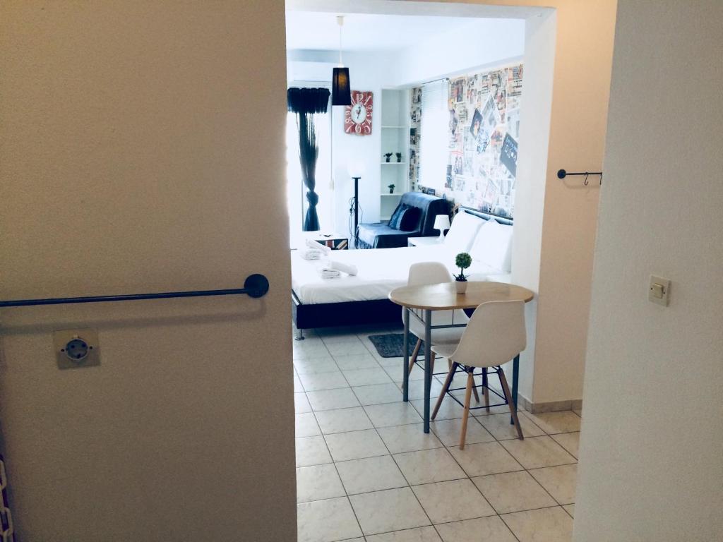 Posteľ alebo postele v izbe v ubytovaní Korona Βeach Αpartments