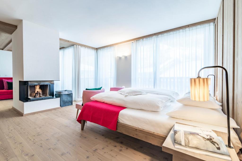 Postel nebo postele na pokoji v ubytování Hotel Drumlerhof