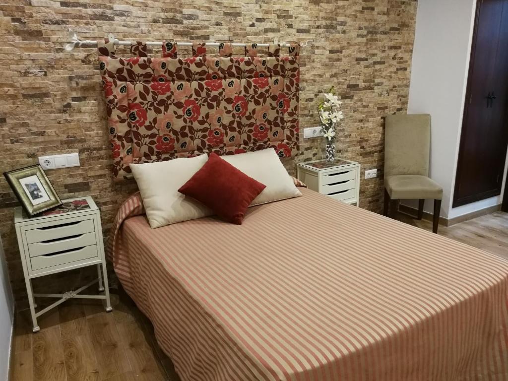 Cama o camas de una habitación en Hostal Maestre