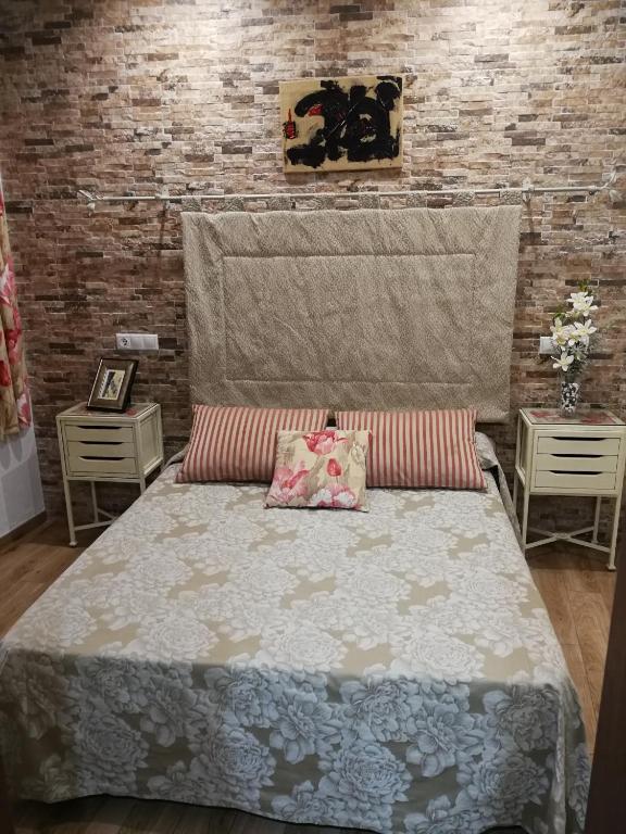 Postel nebo postele na pokoji v ubytování Hostal Maestre