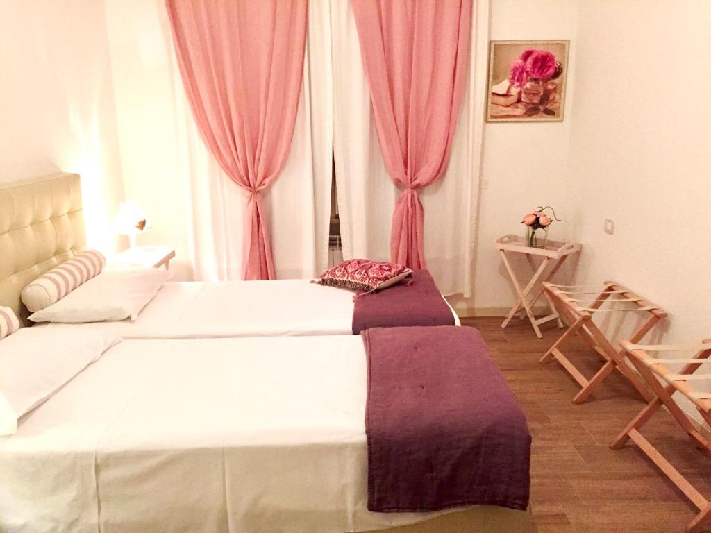 Postel nebo postele na pokoji v ubytování B&B Dolce Olga