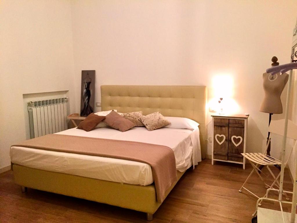 Postel nebo postele na pokoji v ubytování B&B Dolce Olga